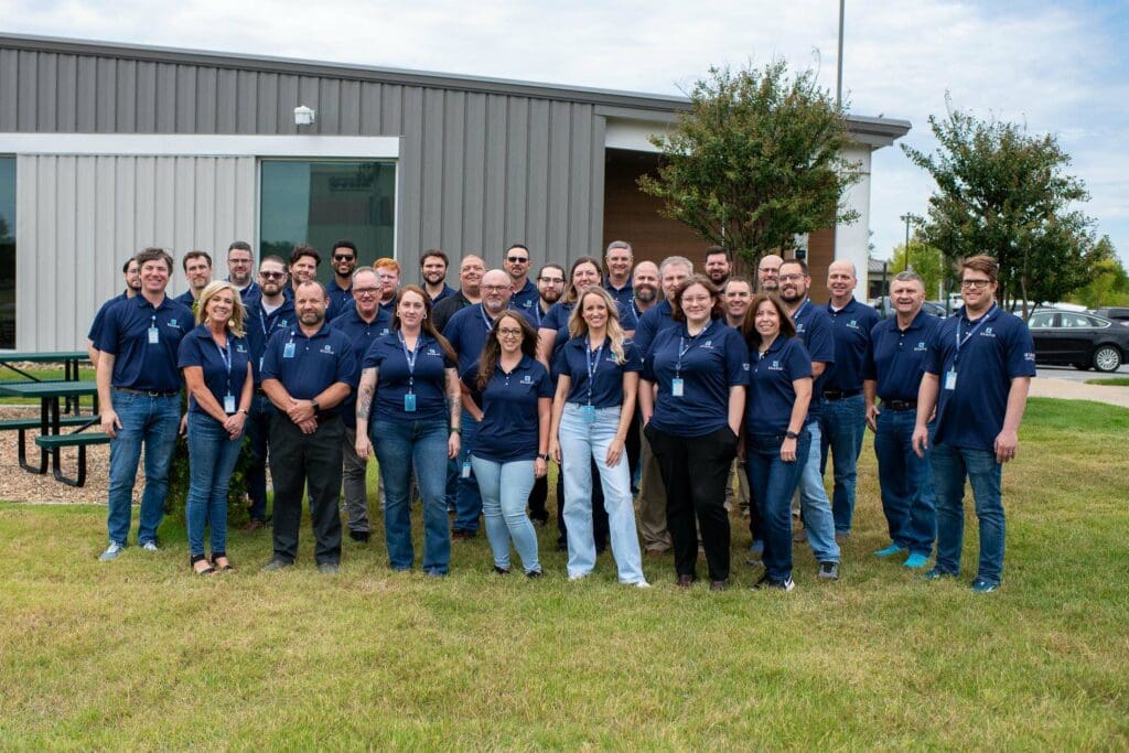 Large group of Edafio employees standing outside the North Little Rock location